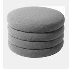 "Stack of gray round cushions on a white background"