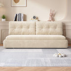 "Beige sofa in a living room setting with decorative items on top - Philips Modern Home"