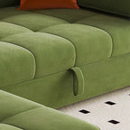 "Green sofa with tufted design on a patterned rug"