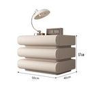 "Beige nightstand with lamp and digital clock, showing dimensions on a white background"