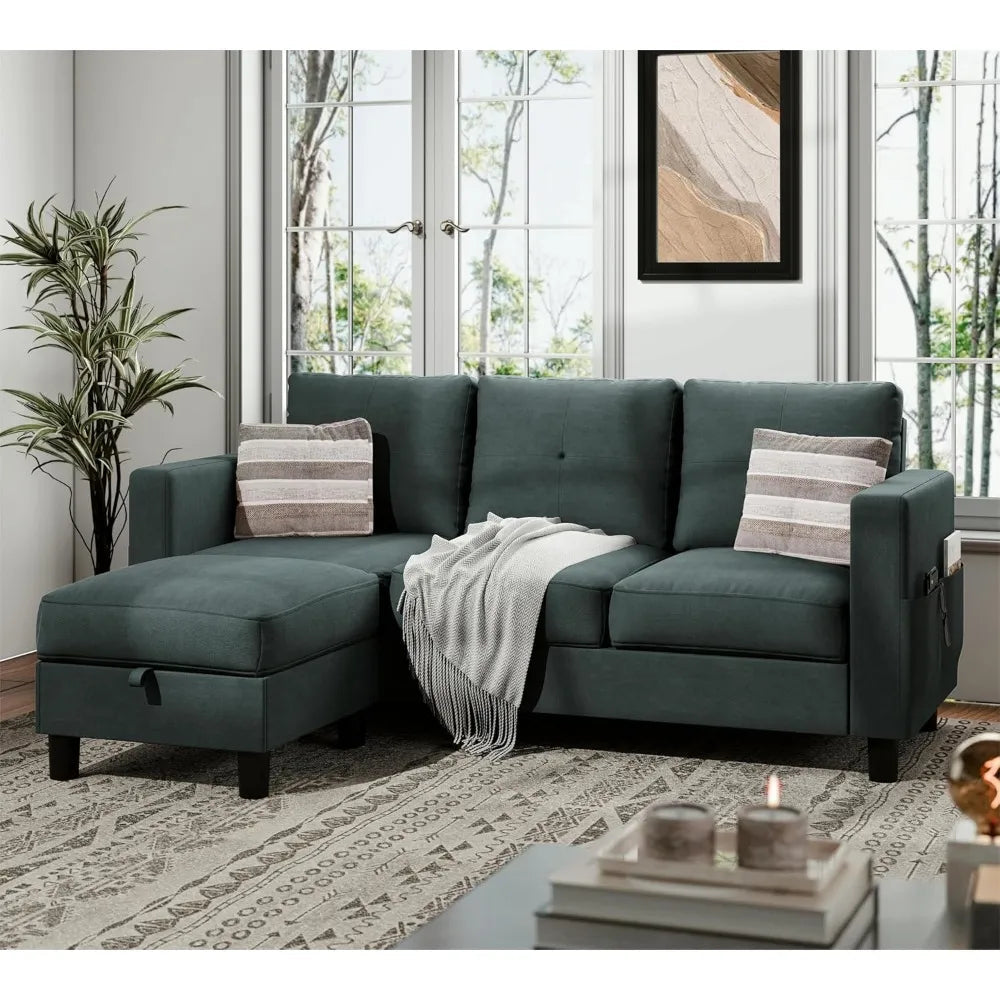"Green sectional sofa in a living room with a plant and coffee table."