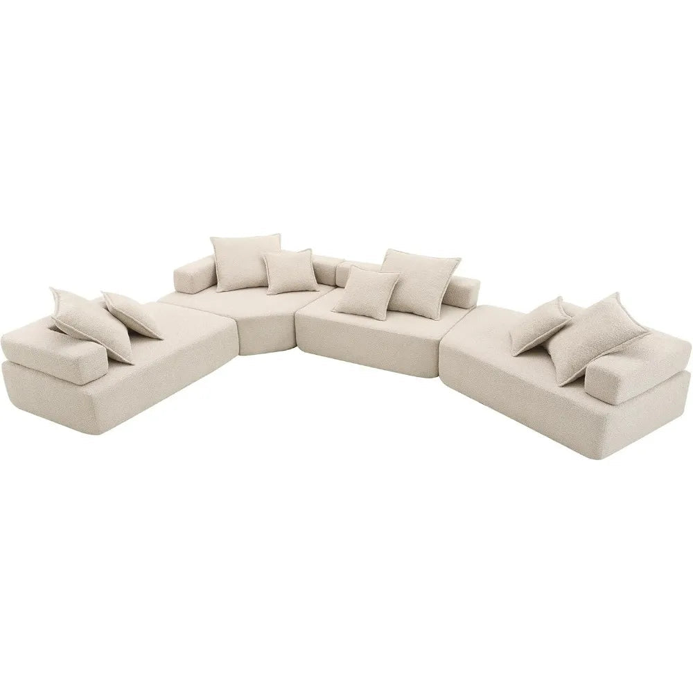 "Beige sectional sofa with cushions on a white background"