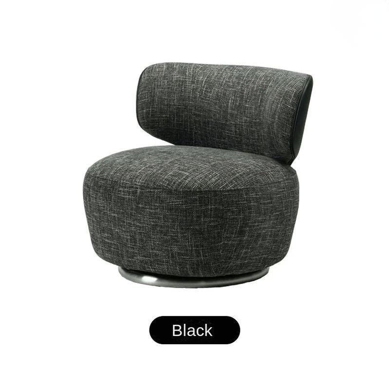 "Gray upholstered chair on a white background with 'Black' label"