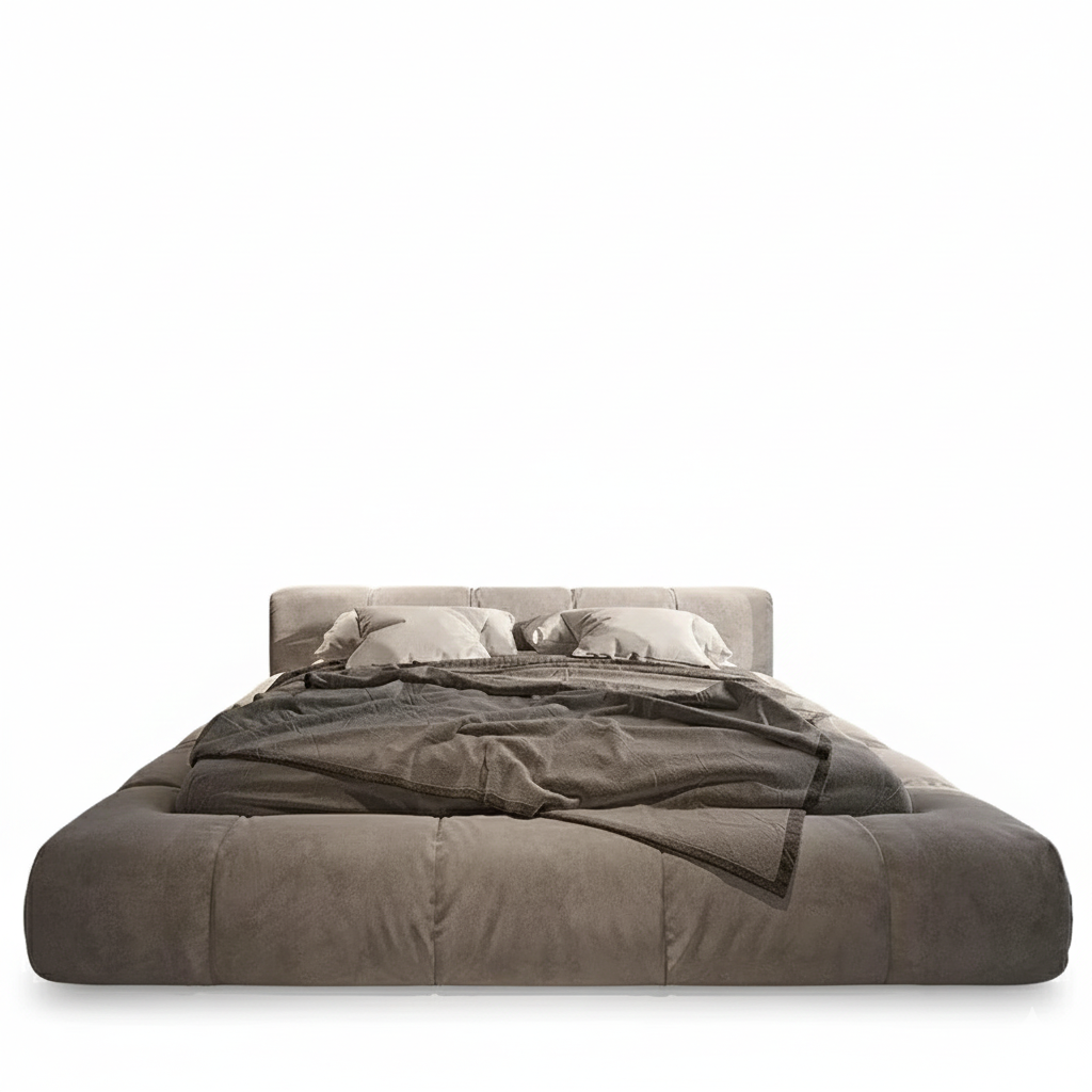 Gray bed with matching bedding on a white background. Velvet bedframe, velvet king bed. 