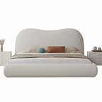 Beige upholstered bed with pillows on a white background. Minimalist bedframe design, Upholstered bedframe, Bedroom furniture, modern aesthetic bed design, bedroom reset, indoor furniture. 