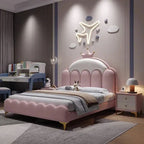 Pink children's bed in a bedroom with a desk and decor. Aesthetic bedroom design, modern bedframe design, cloud style bedframe, minimalist bedframe design. 