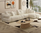 Modern living room with a large white sectional sofa and a wooden coffee table.  Comfina curve style sofa, Living room sofa. 