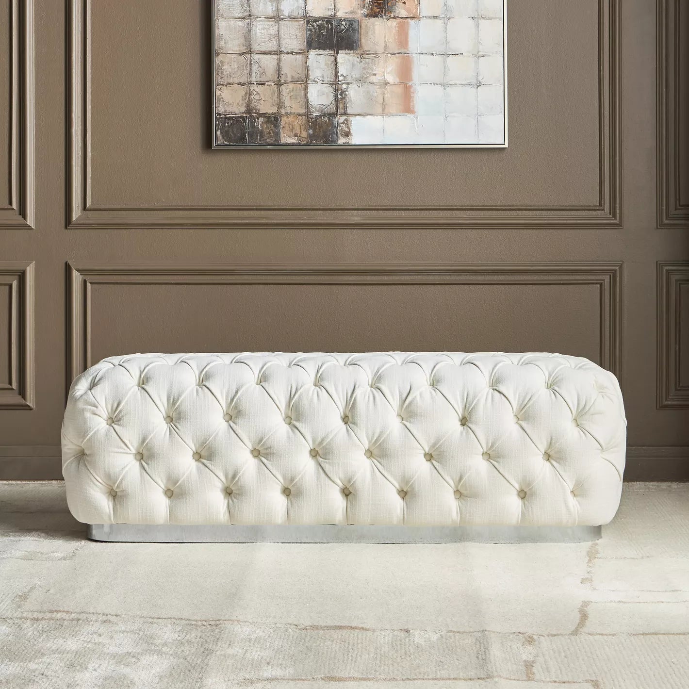 White tufted bench in a room with a abstract painting on the wall.              Tufted bench, Bench chair. 