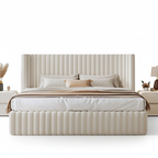 Beige upholstered bed with white bedding on a white background. Modern Bedframe design, European bedframe design, minimalist bedframe design, aesthetic bedframe design. 