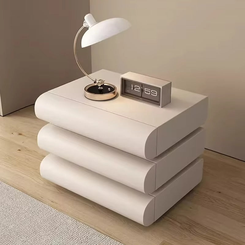 Modern white nightstand with a lamp and digital clock on a wooden floor. Modern Nightstand, Nordic design bedside, French design bedside. 
