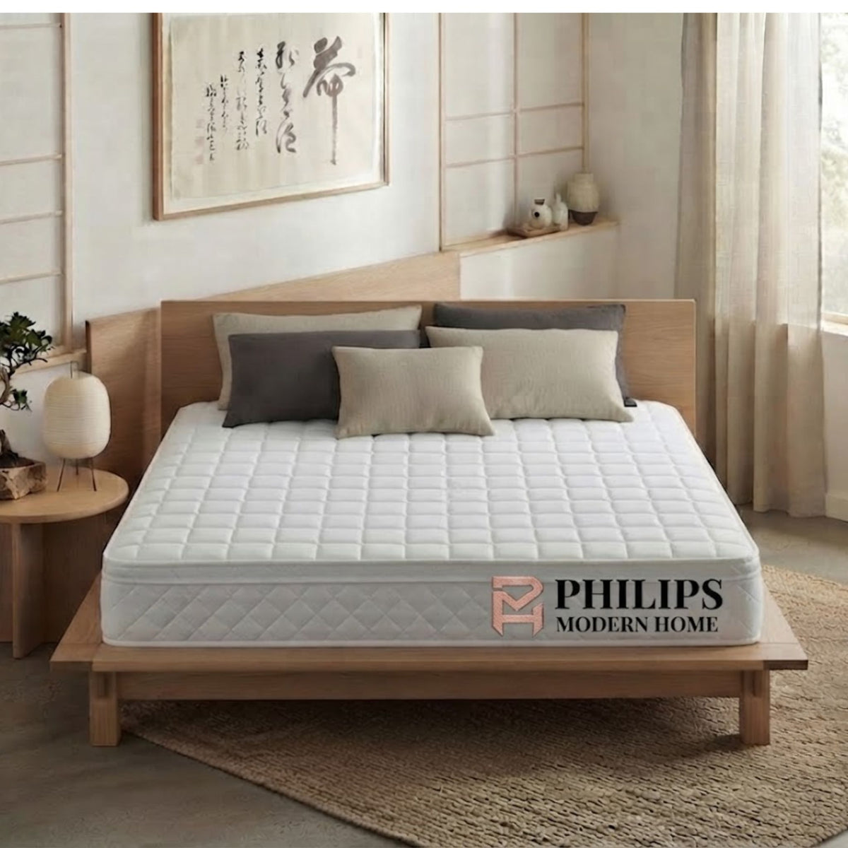 A Hara Comfort Mattress featuring a soft, quilted top, displayed in a serene Japandi-style bedroom with minimalist wooden furniture and a bonsai tree.
