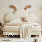 Children's bed with cloud-shaped headboard and teddy bear, measurement label '27cm' visible.
