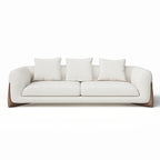 White sofa with three cushions on a white background. Luxury couch design, Solid wood furniture, Living room furniture, Modern aesthetic couch design, minimalist sofa design, indoor furniture, Wood furniture. 