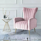 "Pink armchair in a stylish room with a side table and decor items."