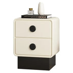 White nightstand with black drawers on a white background. Minimalist bedside table design, aesthetic bedside table. 