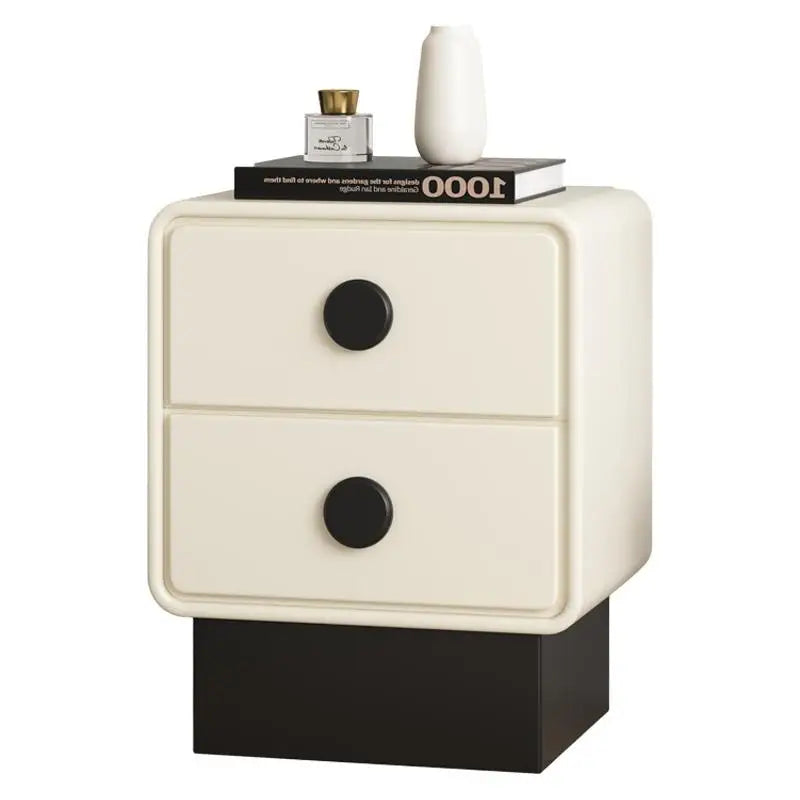 White nightstand with black drawers on a white background. Minimalist bedside table design, aesthetic bedside table. 