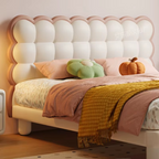 Modern Children's Bed Girls Princess Pink Queen Bed 
Bed with tufted headboard and decorative pillows in a cozy room.