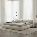 Modern bedroom with a large bed in a minimalistic setting
