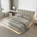 Modern bedroom with a tufted bed and LED lighting