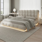 Modern bedroom with a tufted bed and LED lighting