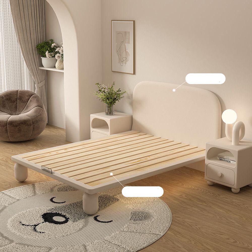 This Luxury Upholstered King Bed embodies contemporary sophistication with its gracefully curved headboard and premium fabric finish. The soft beige tones and vertical panel detailing create an elegant statement piece that brings both comfort and style to any modern bedroom. Crafted with precision, it offers a sturdy frame and plush upholstery for a truly relaxing sleep experience. Perfect for those who appreciate refined aesthetics and quality craftsmanship.