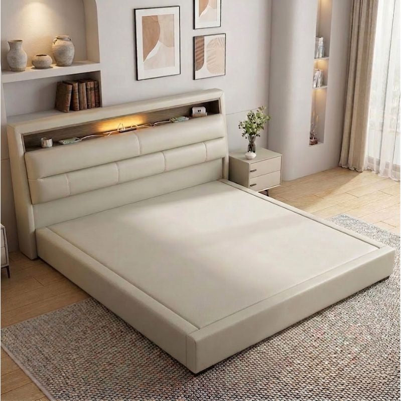 Beige upholstered bed with built-in lighting in a modern bedroom setting.