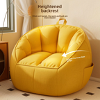 Modern Scandinavian Youth Lazy Sofa Bean Bag Chair Single Bedroom Balcony.
Yellow bean bag chair with heightened backrest feature in a room setting.