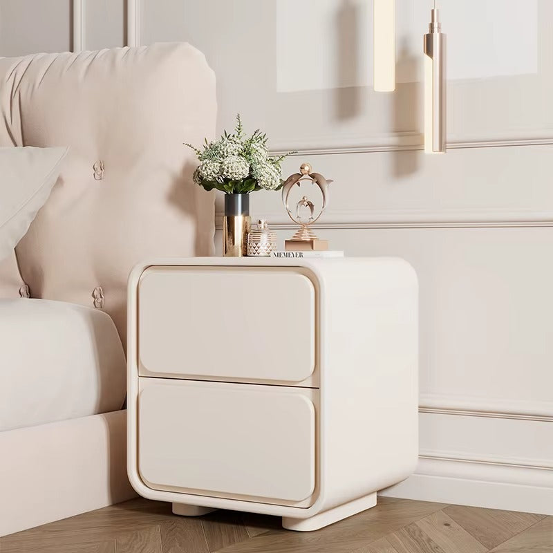 Modern Style Bedroom Nightstand Solid Color. Beige side table with decorative items next to a beige armchair in a room. Bedroom nightstand, Solid wood furniture, Modern style nightstand, Minimalist design. 
