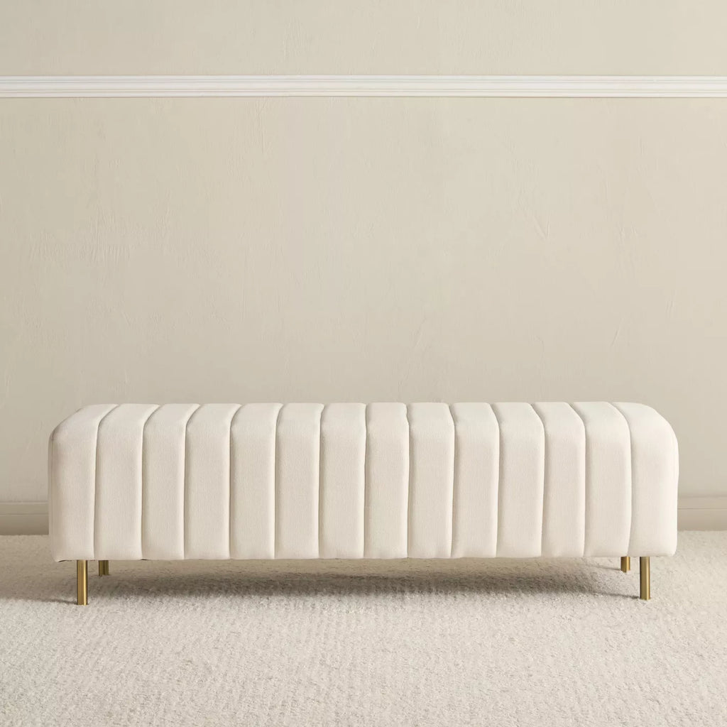 Beige upholstered bench with gold legs on a neutral background. Aesthetic bench chair, Modern Upholstered bench. 