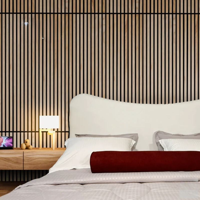 "Modern upholstered bed. Bedroom with striped wall, nightstand, and lamp."