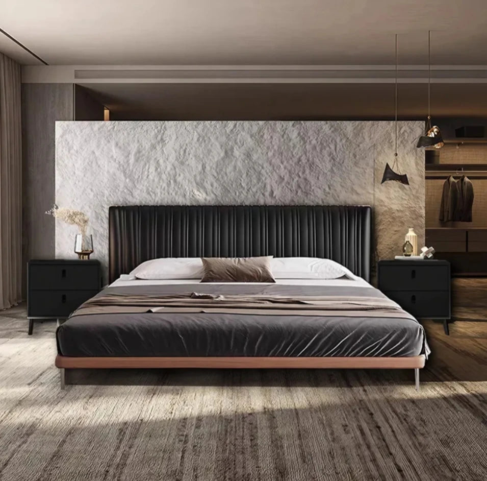 Nordic Style Upholstered Bed Frame with Headboard 
Modern bedroom with a large bed against a marble wall.