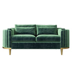 Green velvet sofa with gold legs on a white background
