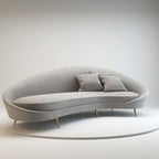 Modern gray sofa with two cushions on a white background. Living room furniture, modern sofa design, aesthetic sofa design, luxury sofa design, velvet sofa seat. 