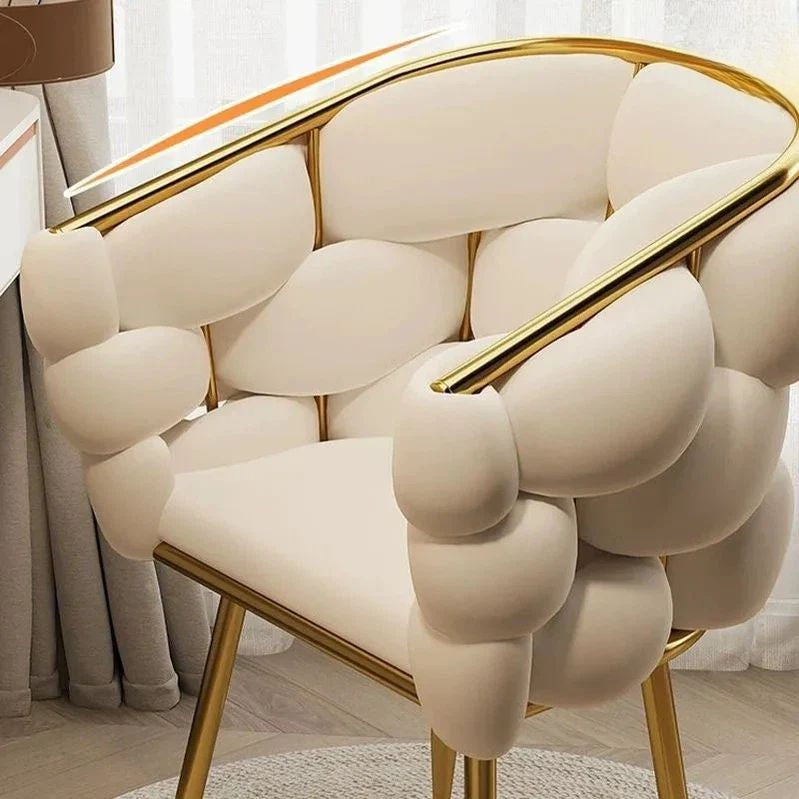 "Premium Cloud Style Vanity Chair For Dressing Table. Beige armchair with gold frame in a room setting"