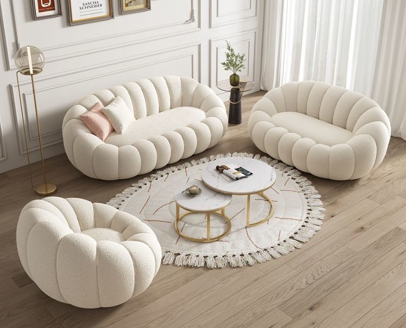 Modern living room with white round sofa set and decorative items. pumpkin chair design, Living room sofa, 3 seater sofa seat, minimalist sofa design, aesthetic living room design. 