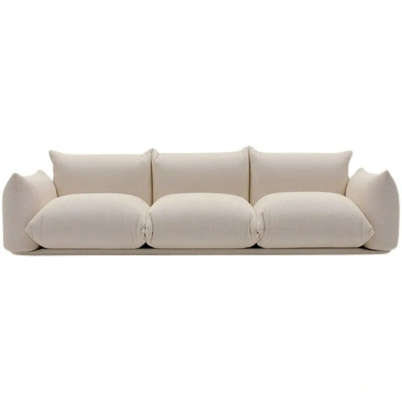 Puffy European Style 3-Seater Sofa. Beige sofa with rounded cushions on a white background. Aesthetic minimalist sofa, 3 seater sofa design, European sofa design, modern sofa design. 