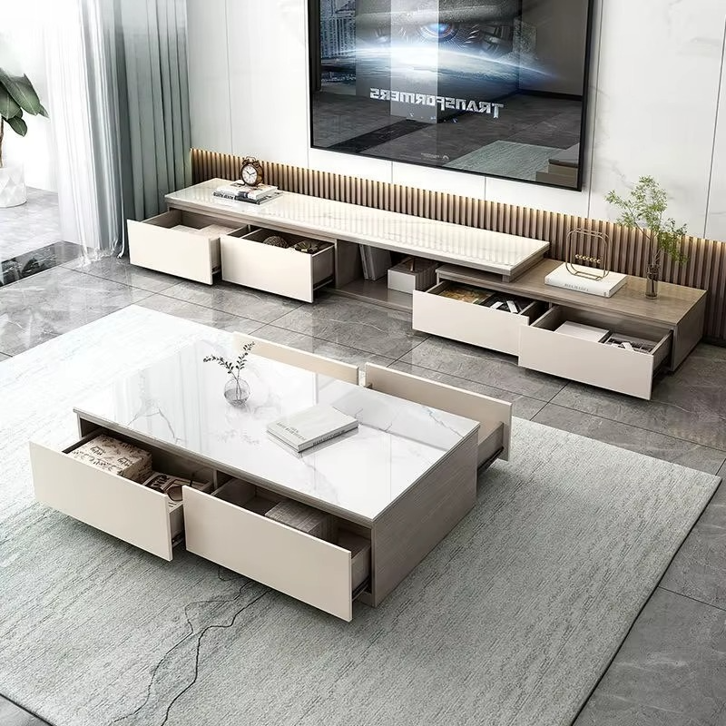 Modern living room with a large TV, coffee table, and storage units.