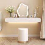 Modern vanity setup with a lighted mirror, stool, and decorative items in a room. Vanity desk, make up vanity, dressing table with mirror. 