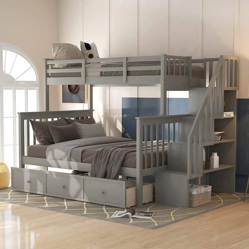 "Gray bunk bed with stairs in a room with a window and furniture."