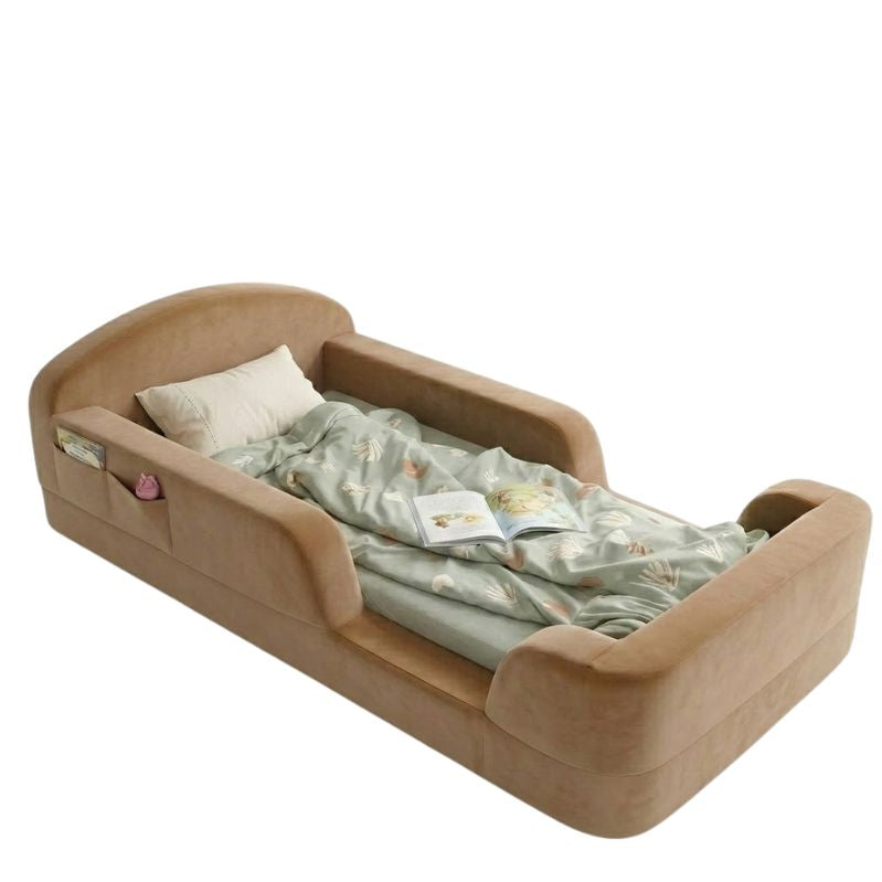 Children's bed with a pillow and blanket on a white background