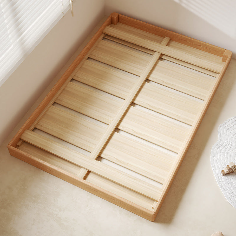 Wooden tray with slatted design on a light-colored floor