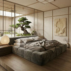 Luxury Astrid low-slung bed in a Japandi-aesthetic bedroom with minimalist wood paneling and a serene bonsai garden view.