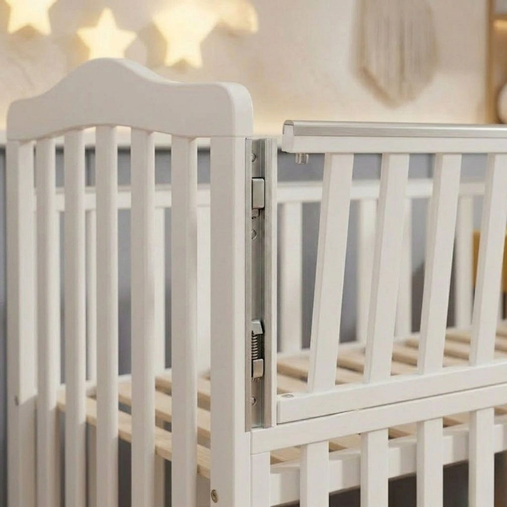 Close-up of the smooth rounded spindles and non-toxic finish on the Celestia 90x140cm nursery crib