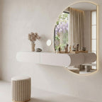 The Luna Floating Dressing Station styled in a serene Japandi room with an architectural mirror and fluted wood paneling