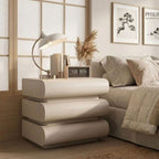 Lifestyle shot of the Celine Arcane Bedside Table styled with a minimalist lamp in a contemporary master suite