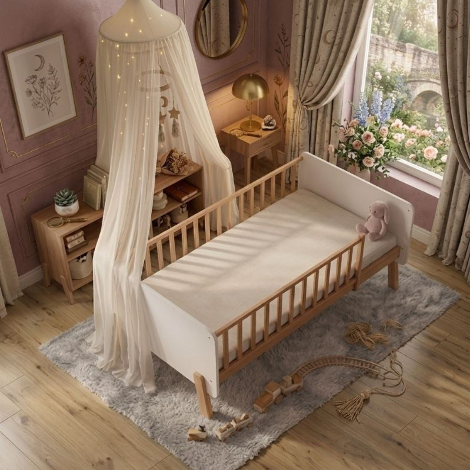 Detailed view from above of the Norse Scandi Toddler Bedframe, showing the natural wood spindle side rails, white end panels, and standard toddler mattress, handcrafted by Philips Modern Homes