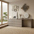 Modern bedroom with a dresser, mirror, and decor items.