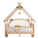 Snug Harbor Canopy Bedframe featuring a house-shaped solid wood structure and a plush cloud-shaped headboard, handcrafted by Philips Modern Homes