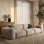 Close-up detail of the premium soft-touch upholstery and plush cushioning on the Stratus sofa by Philips Modern Homes