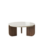 A professional studio photograph of the Terra Marble Occasional Coffee Table with a travertine stone top and dark wood base, isolated on a clean, pure white background for GMC compliance